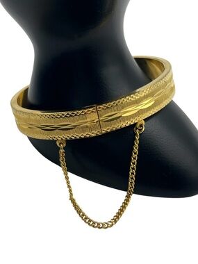 Etched design diamond cut checkerboard gold tone hinged clamper bangle bracelet